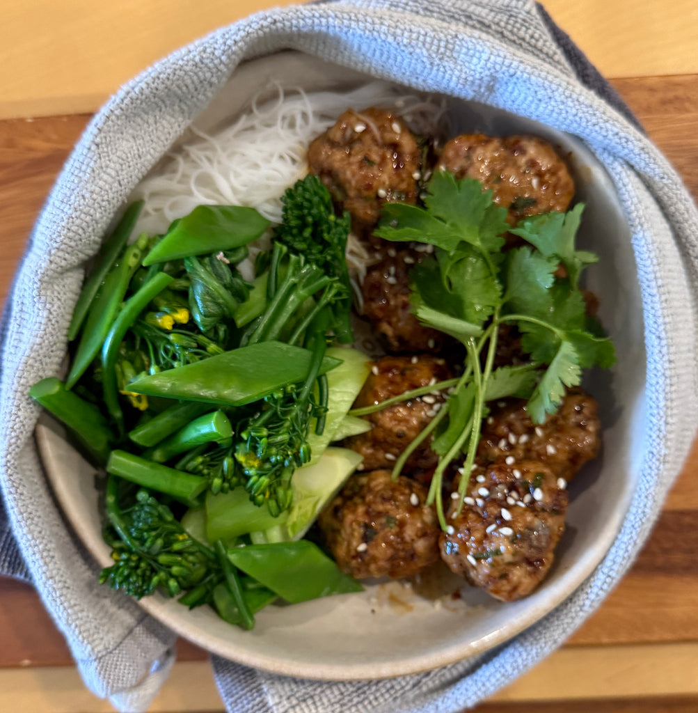 Asian Pork Meatballs with Kabayaki Sauce, Rice Noodles and Tossed Greens