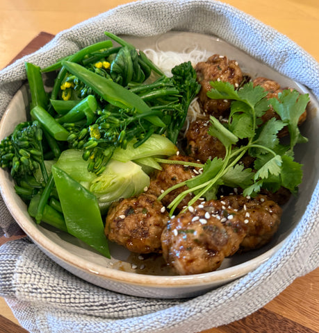 Asian Pork Meatballs with Kabayaki Sauce, Rice Noodles and Tossed Greens